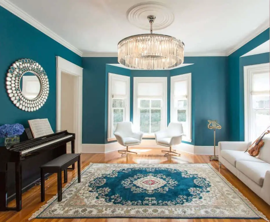 What colour goes well with teal in living room?