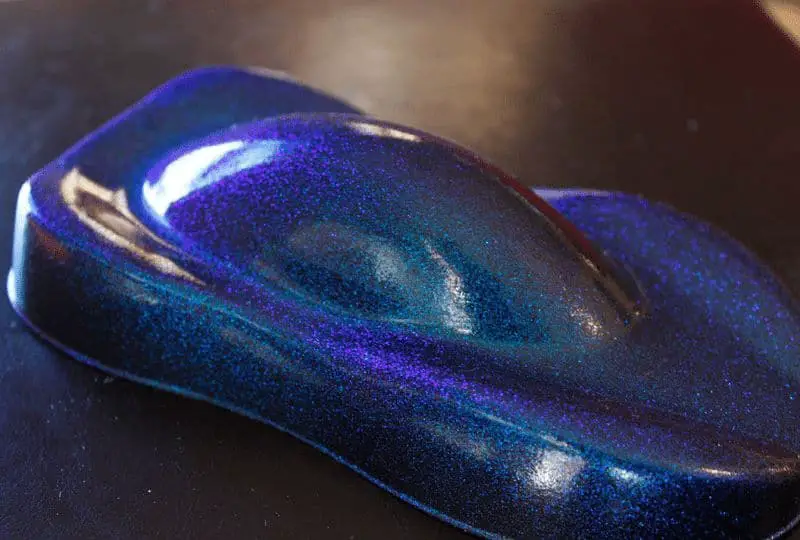 What happens if you mix blue and purple paint?
